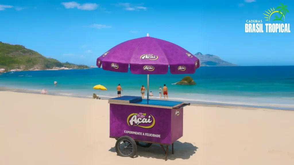 Imagem no meio de uma praia e ao centro um carrinho de açai com um guarda-sol personalizado da marca.